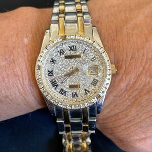 8 inch stainless steel gold tone rhinestone Manhattan watch with calendar.